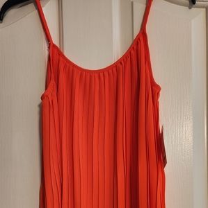 Tangerine pleated top.